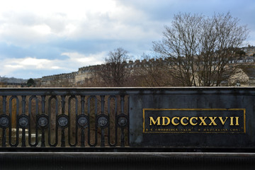 Roman numerals on bridge in Bath, UK. Bridge built in 1827 between Cleveland Place and Bathwick Street in Bath, UK.
