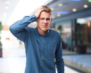 angry young-man suffering a headache