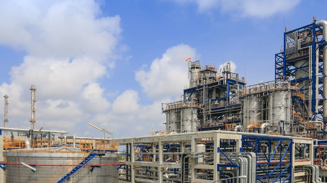 Oil Refinery plant with cloudy sky , Time lapse