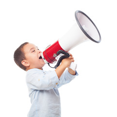 portrait of a little boy shouting on the megaphone