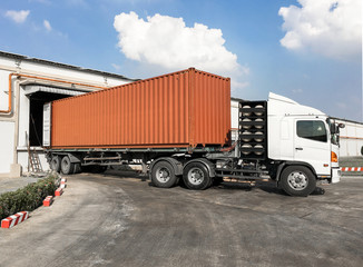 Container truck loading goods at warehouse - obrazy, fototapety, plakaty
