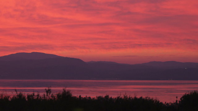 Royalty Free Stock Video Footage of the sunset at the Sea of Galilee shot in Israel at 4k with Red.