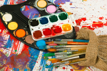 Brushes, paints, pencils for drawing