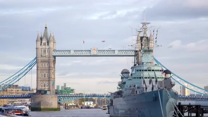 Big ship passes under Tower bridge in London, England. - Powered by Adobe