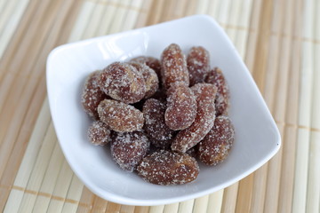 Rakkasei Amanatto is a Japanese confection dusted with sugar and boiled soft peanut.
