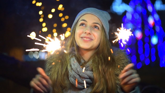 Young girl with a sparkler