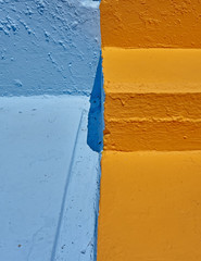 vibrant orange and blue rough surfaces close-up