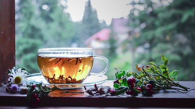 .Hot tea on a windowsill. Video.