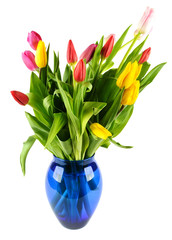 Bouquet of tulips in a blue glass vase.