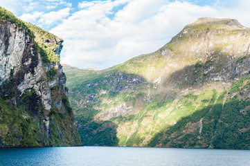 Geiranger Fjord in Norway with big mountains rising from the sea