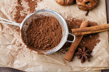 cinnamon, cocoa powder and anise on baking paper