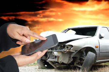 woman hand using phone after accident, insurance concept