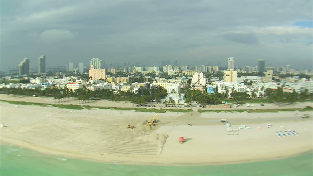 Aerial shot of hotels and a beach in Miami.