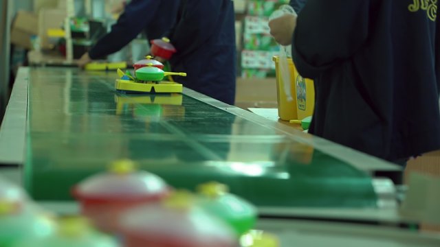 Toy Factory Workers Pack Products and Pack it in