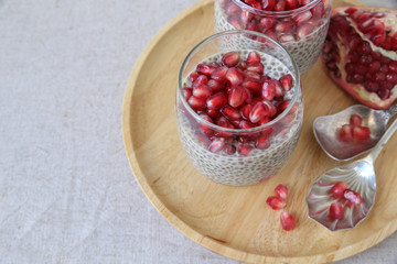 Chia seeds pudding with pomegranate, selective focus