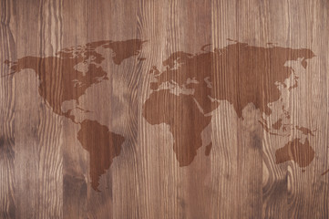 World map on wooden board