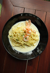 White cream sauce spaghetti with shrimp.