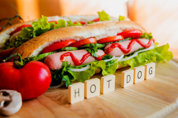 Large hot dog with vegetables