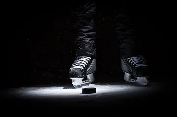 Gordijnen Hockey player. Legs only view © Vasilev Evgenii