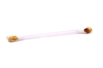 Ear wax on cotton swab isolated on white background