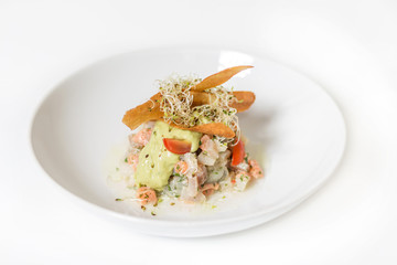 Seafood ceviche, typical dish from Peru. Isolated on white