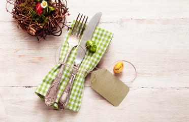 High angle view of happy easter cutlery with napkin