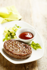 Beef burger with tomato sauce