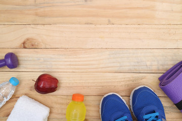 sports, concept of weight loss : Sport shoes and water with set for sports activities on tiled floor