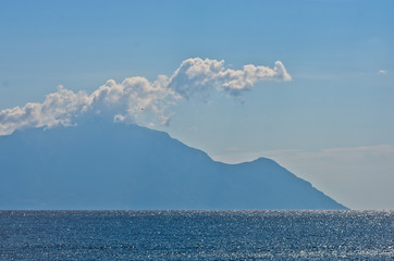 Aegean sea and silhouette of the holy mountains Athos, Greece
