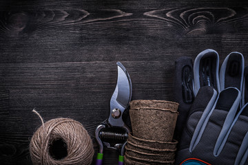 Safety gloves secateurs peat glasses hank of string horizontal v