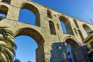 Fototapeta na wymiar Ruins of medieval aqueduct in Kavala, East Macedonia and Thrace, Greece