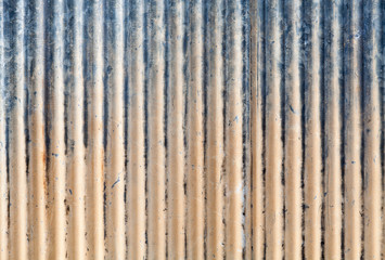 A background of peeling paint and rusty old metal