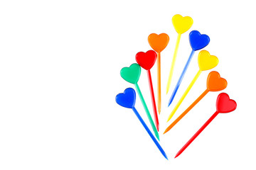 colorful skewers with hearts for snacks isolated on white background