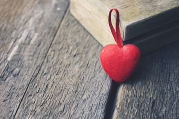 Small heart wooden background