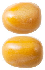 Fototapeta na wymiar two yellow jasper gemstones isolated