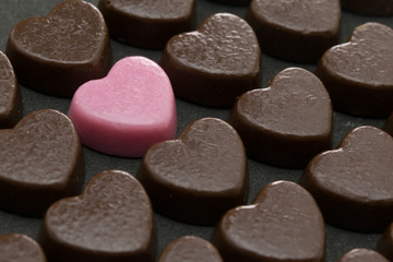 Obraz na płótnie Canvas heart shaped chocolates for valentine’s day