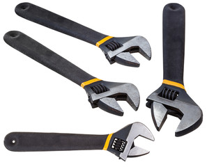 set of black adjustable spanners isolated