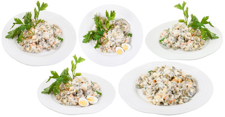 plates with olivier russian salad with mayonnaise