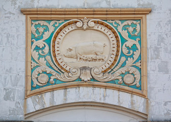 Obraz premium Bas-relief of the Soviet era in the building of the livestock pa