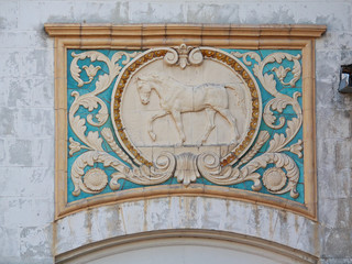 Bas-relief of the Soviet era in the building of the livestock pa