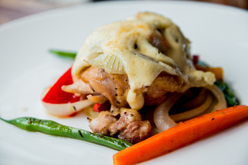 Meat with vegetables and cheese