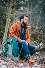 bearded man on the winter forest