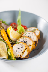 Modern style salad with chicken breast