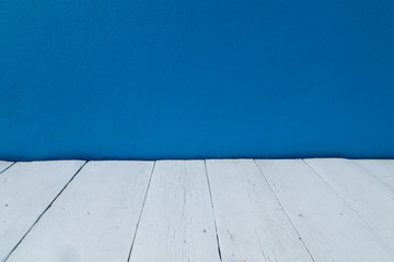 Blue wall and wooden floor interior background