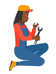 Repairer holding spanner.