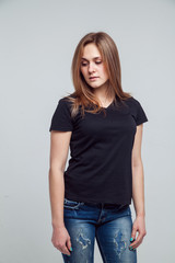 girl in the black shirt isolated over white background