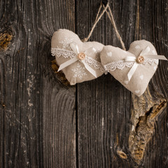 wooden heart hanging on a branch