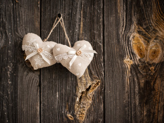 wooden heart hanging on a branch