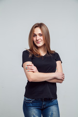 girl in the black shirt isolated over white background