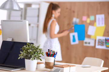 Fashion designers working in studio